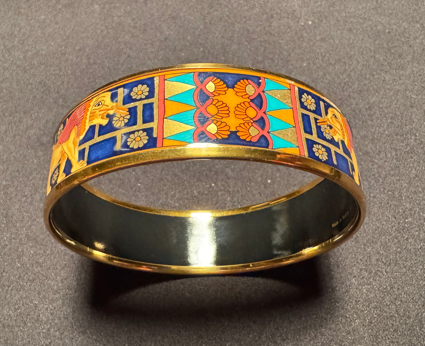 Bracelet émaillé bleu HERMÈS - « les lions » - métal doré