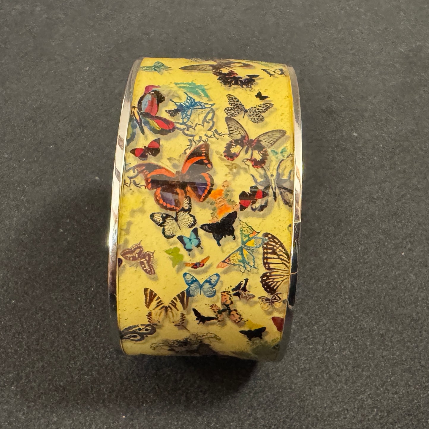 Bracelet créateur CHRISTIAN LACROIX motif aux papillons - Métal et résine