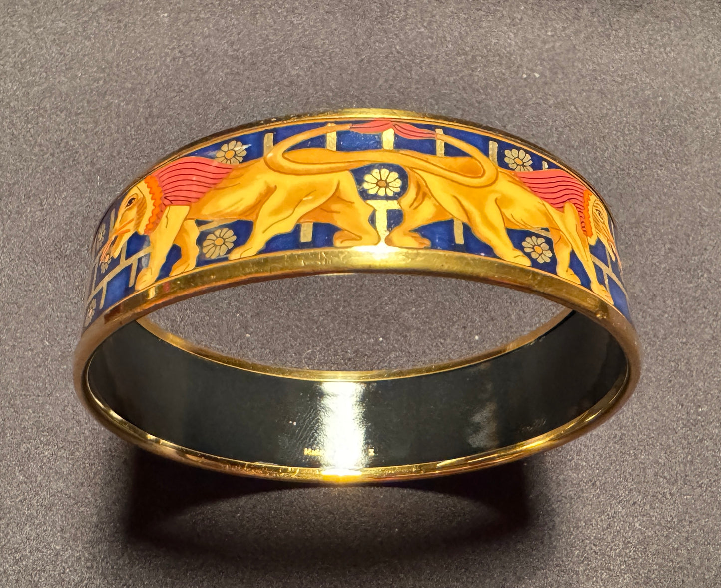 Bracelet émaillé bleu HERMÈS - « les lions » - métal doré