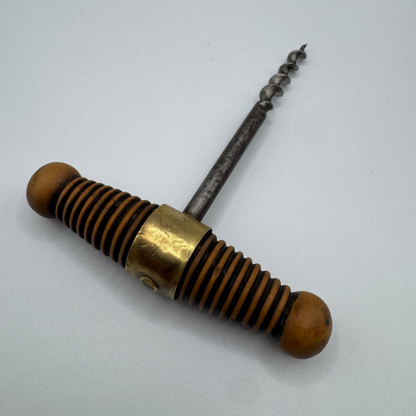 Tire bouchon ancien bronze acier et bois