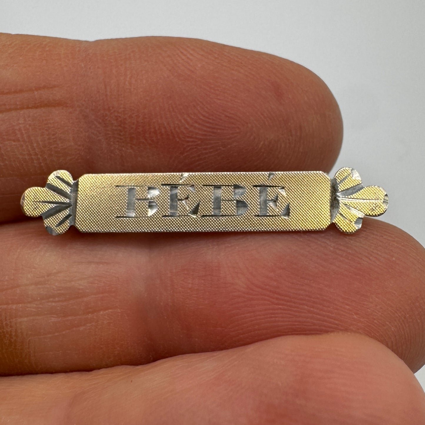 Broche ancienne en argent vermeil « bébé »