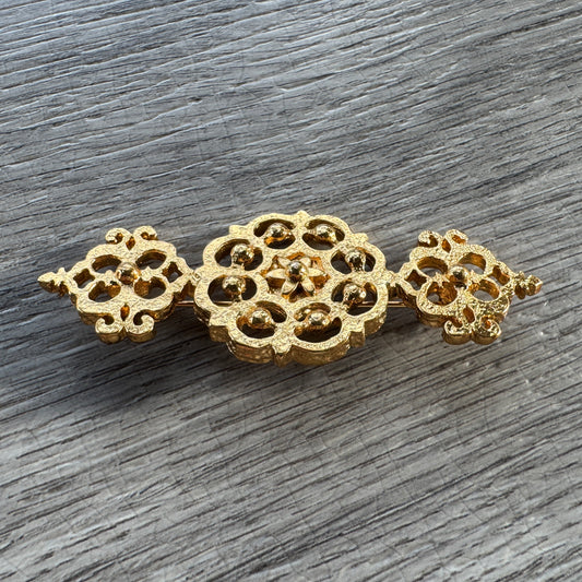 Broche mauresque YVES SAINT LAURENT - plaqué or