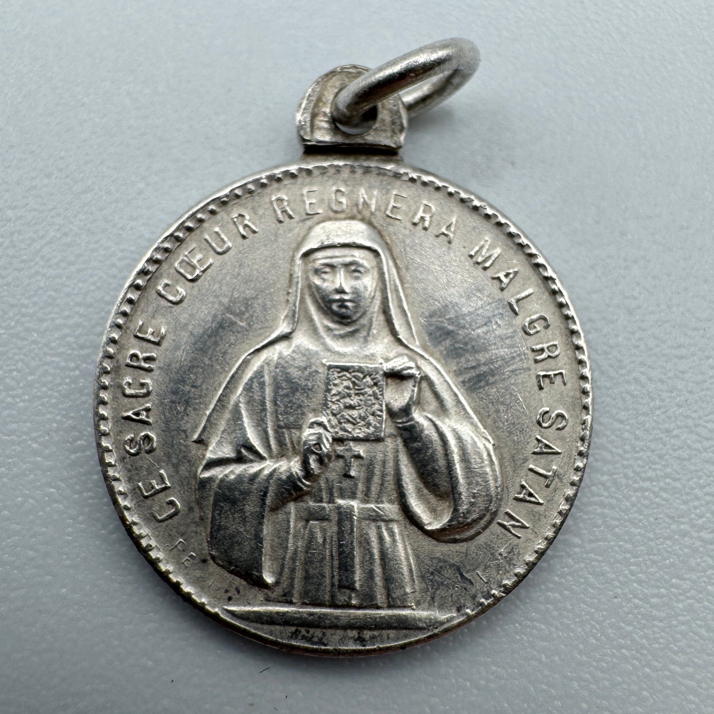 Médaille religieuse ancienne « Le sacré cœur régnera »