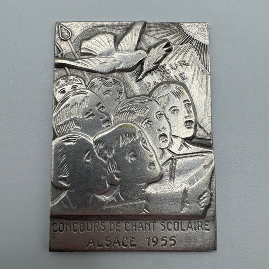 Plaque Médaille ancienne en bronze argenté « concours de chant scolaire Alsace 1955 »