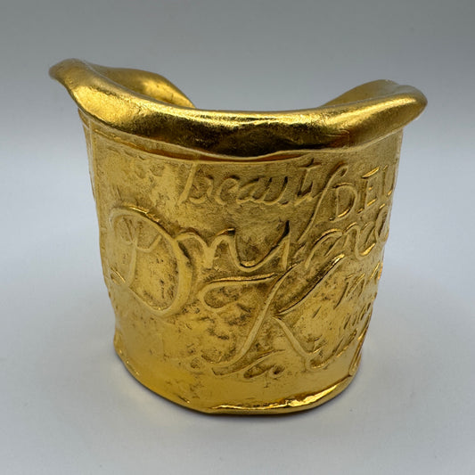 Petit pot artistique Donna Karan - métal doré