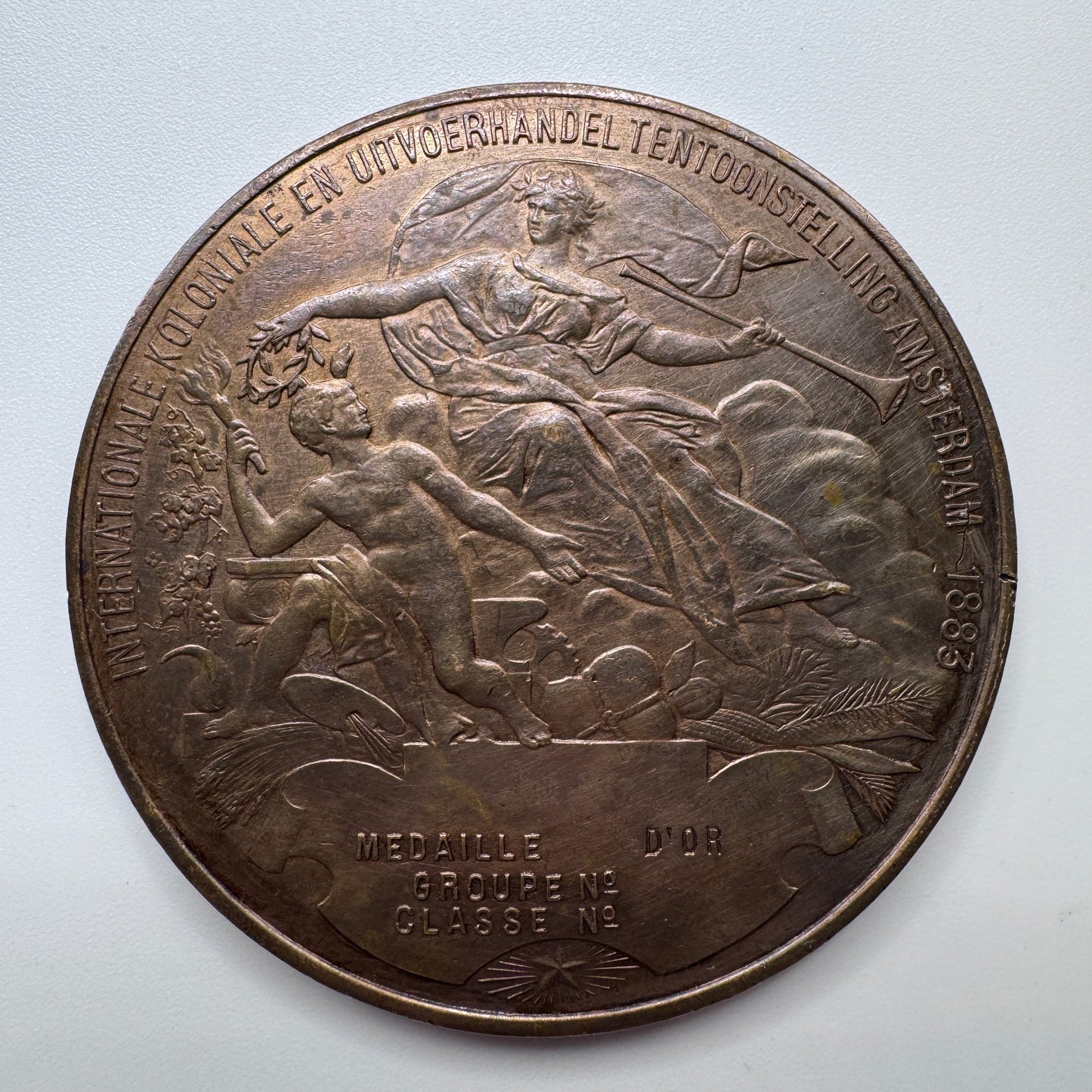 Médaille ancienne « Exposition Internationale du Commerce Colonial et D'exportation AMSTERDAM 1883 »