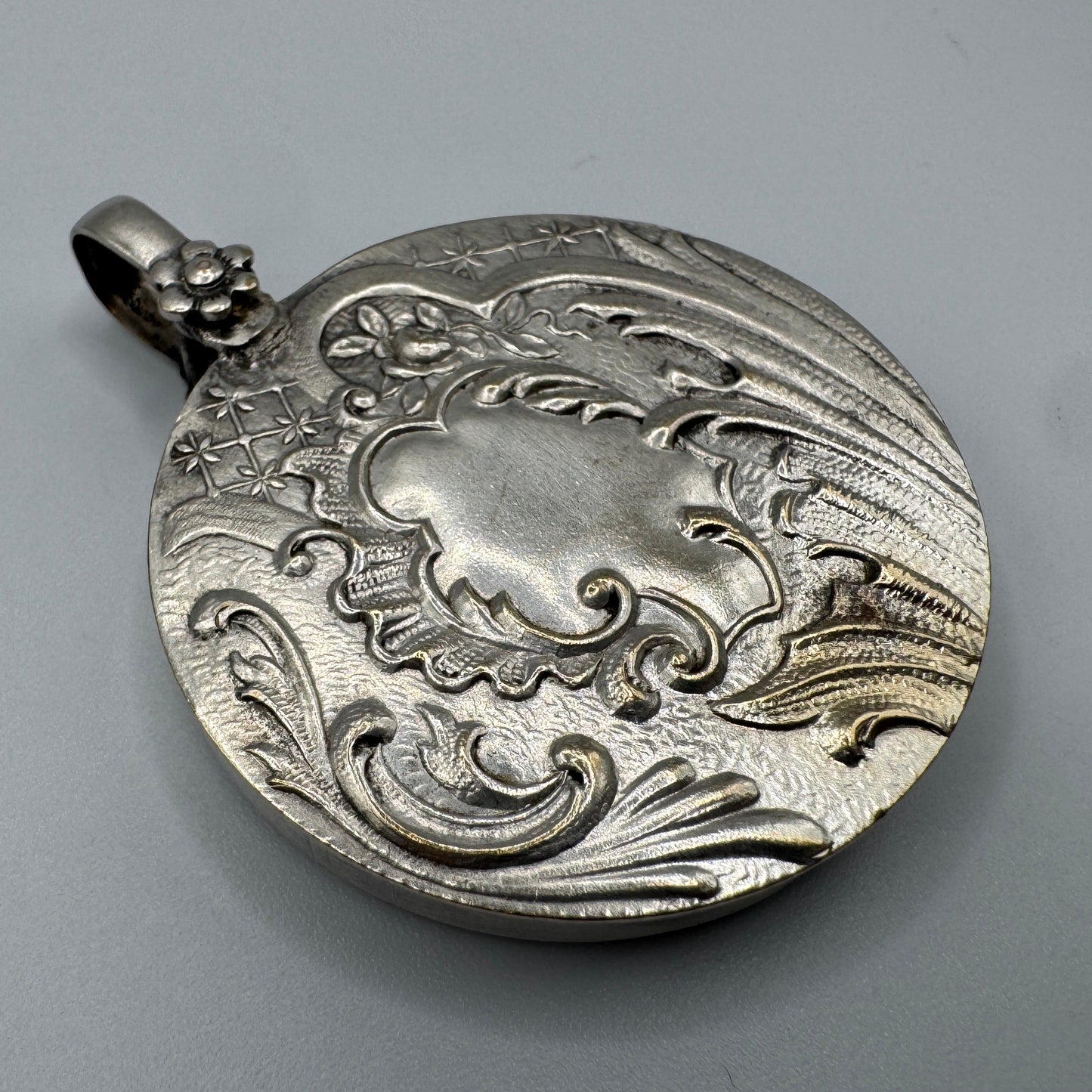 Miroir de poche ancien vers 1900