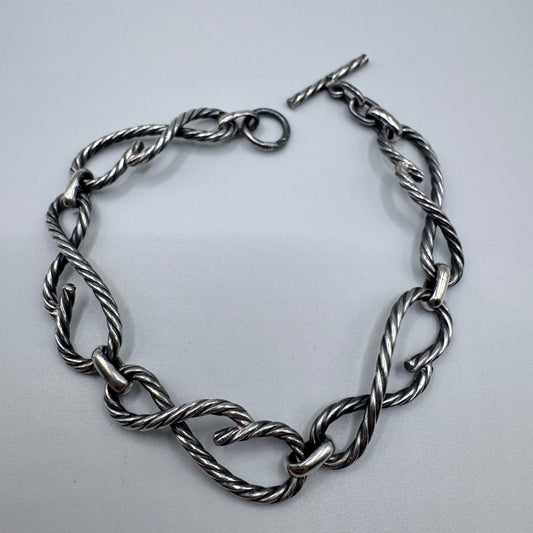 Bracelet ancien en argent torsadé