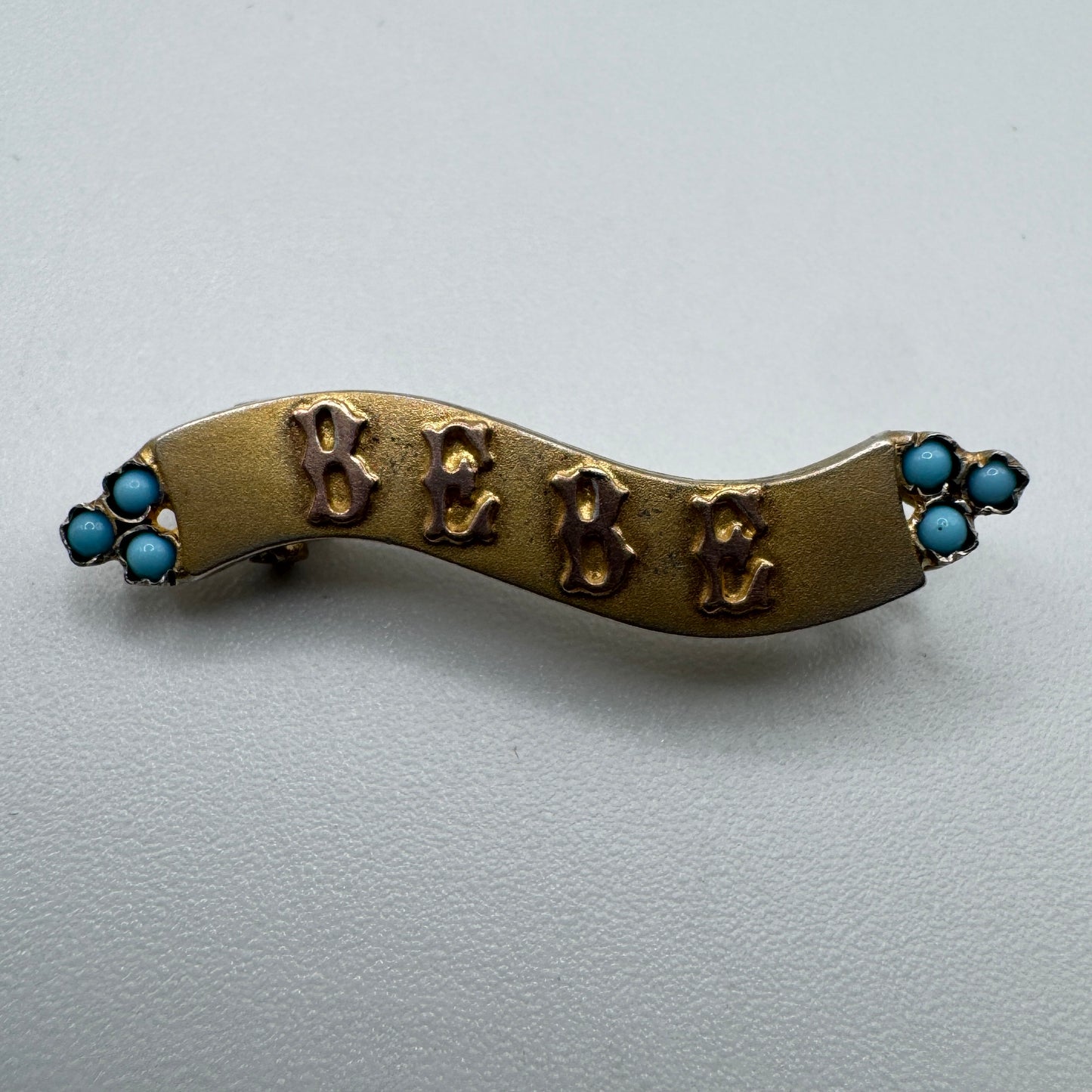 Petite Broche ancienne en argent vermeil « bébé »