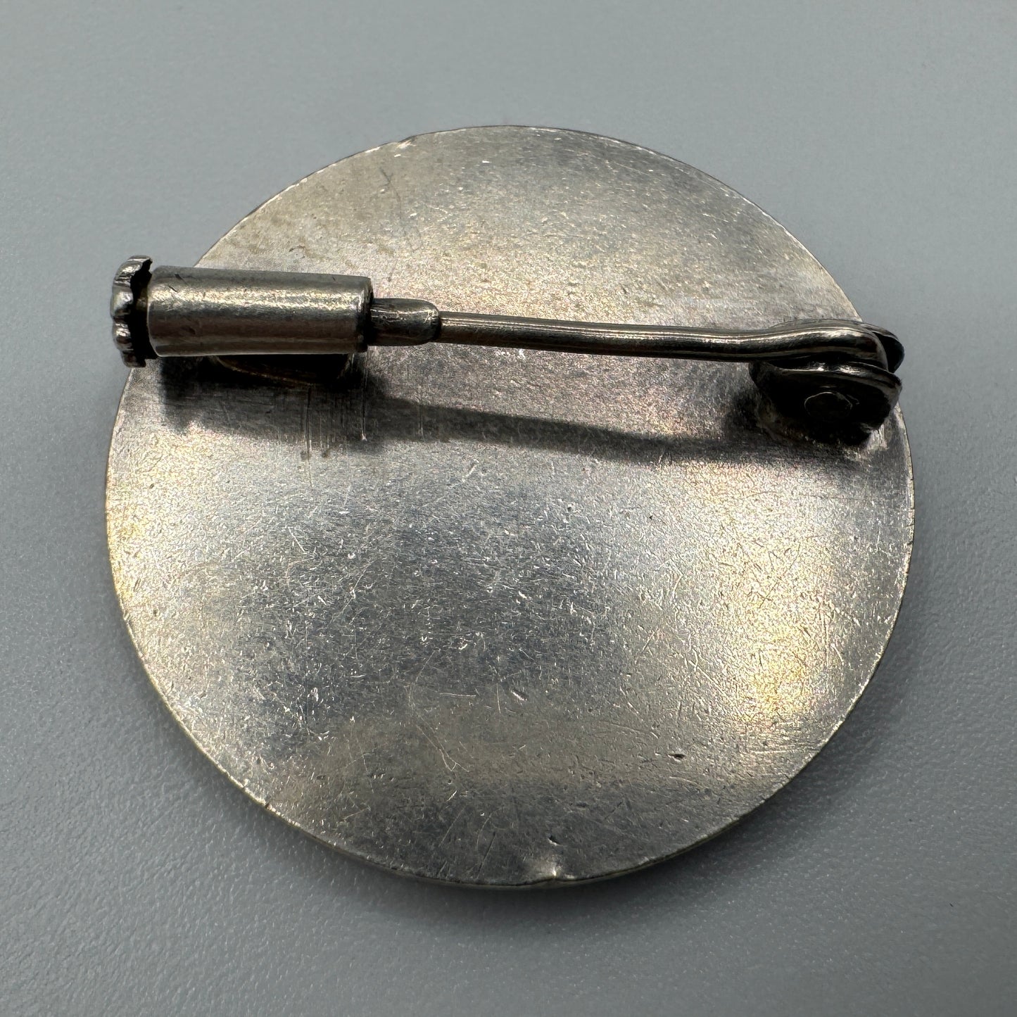 Broche ancienne signée Coudray « Orphée » argent massif