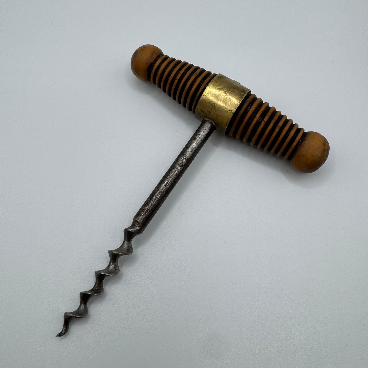 Tire bouchon ancien bronze acier et bois